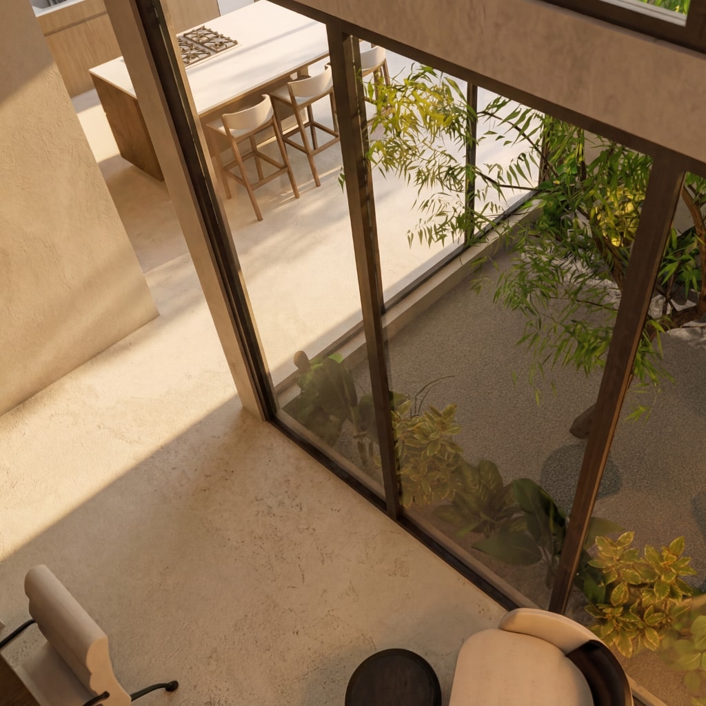 Interior of a luxury Cabo villa featuring limestone floors, large glass walls, and minimalist wooden furniture