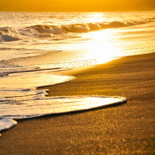 Tranquil beach in Cabo during golden hour
